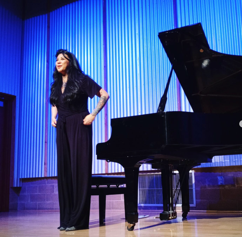 Melissa Alcazar with grand piano